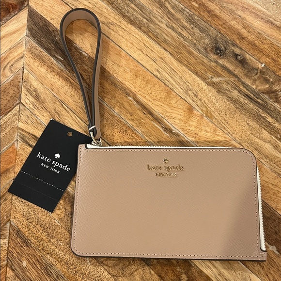 kate spade Accessories - Kate Spade Beige Wristlet with Strap
